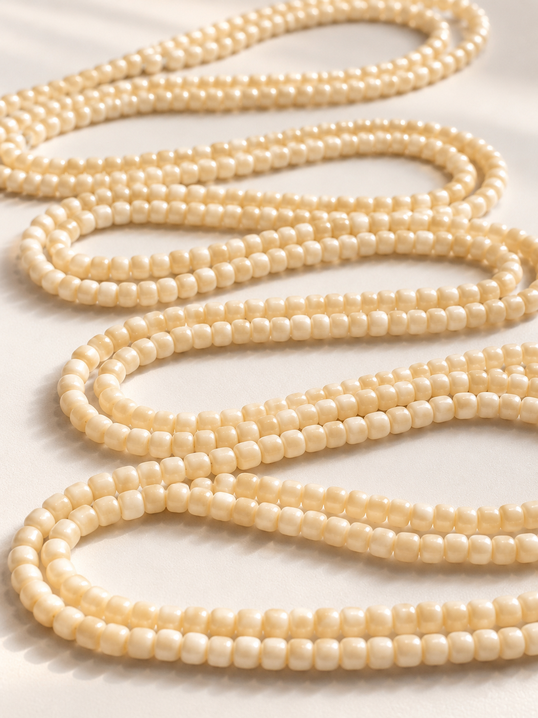 Soft Landing beige simple waist bead strand